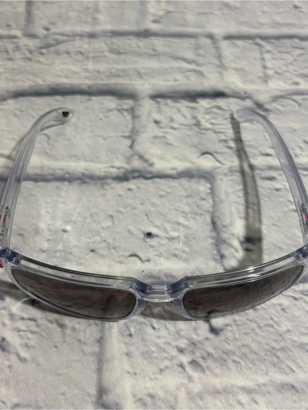 Oakley “Holbrook” customized clear frame/pink detail sunglasses + sleeve
